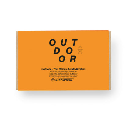 Geschlossene orange STAY SPICED ! OUTDOOR Geschenkbox von Tom Heinzle für ambitionierte Grillmeister